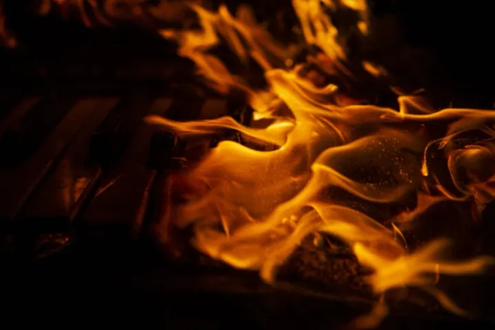 Close-up of flames against black